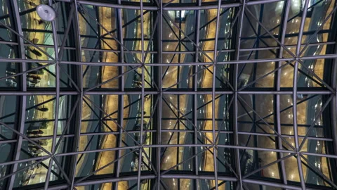 Reflection of mall visitors in its glass roof, time lapse Stock Footage 117563657