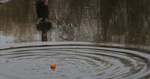 Reflection  of Man Casting Bobber in Water Stock Footage 73905736