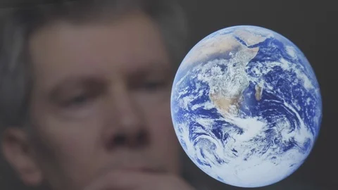 Reflection of a man looking at the earth Video stock 102589938