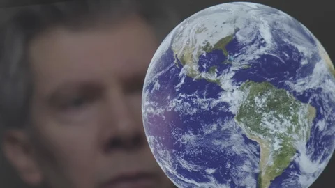 Reflection of a man looking at the earth Video stock 102590336