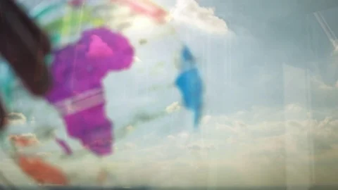 Reflection of a man looking at a globe Video stock 85166164