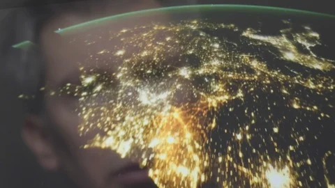Reflection of a man looking at a view of the earth from space Video stock 102597436