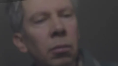 Reflection of a man looking at a view of the earth from space Video stock 102600832