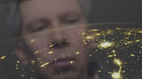 Reflection of a man looking at a view of the earth from space Video stock 102605775