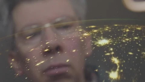 Reflection of a man looking at a view of the earth from space Video stock 102608855