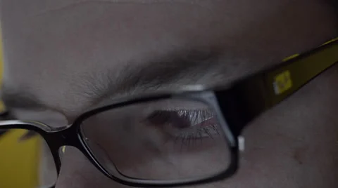 Reflection on mans eyeglasses. 4K UHD Stock Footage 49585110