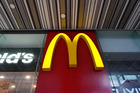 Reflection of McDonald's Logo and name on the floor Fotos de archivo