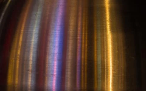 A reflection on a metallic surface at night Stock Photos