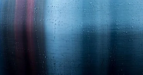 A reflection on a metallic surface in the rain Stock Photos