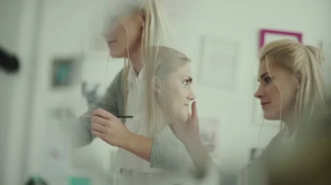 The reflection in the mirror make-up work Stock Footage 68044730