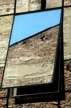 Reflection on the mirror window Stock Photos