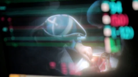 Reflection in the monitor of surgeon doing open heart surgery Stock Footage
