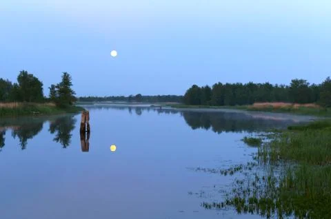 The reflection of the moon in the pond, clear night, moonlight Stock Photos