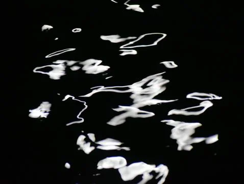 Reflection of moonlight in the water. Abstraction. Background. Stock Photos