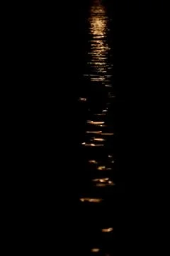 Reflection of moonlight on water Stock Photos