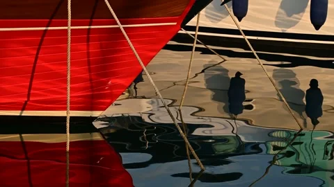 Reflection of moored yachts in the clear blue water of the sea port Video stock 317981601