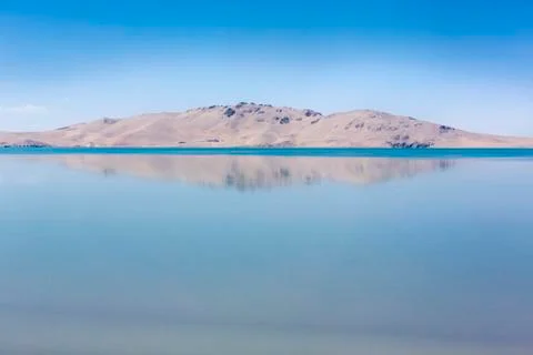 Reflection of the mountain in a lake in Tibet Stock Photos