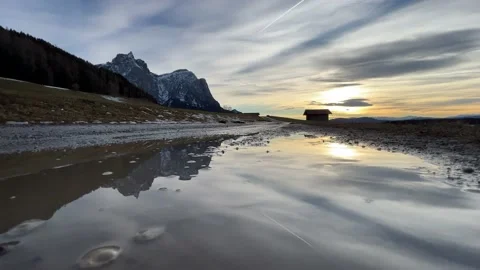 Reflection of the mountain in the puddle Video stock 232219858