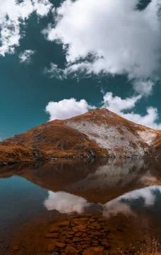 Reflection of mountains and clouds in the glacial lake. picture taken on 03.0 Stock Photos