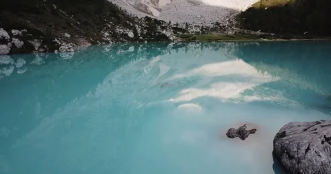 Reflection of mountains in lake water Stock Footage 129170009