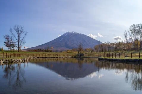 Reflection of Mt Yotei in a lake in Hirafu, Hokkaido, Japan Stock Photos