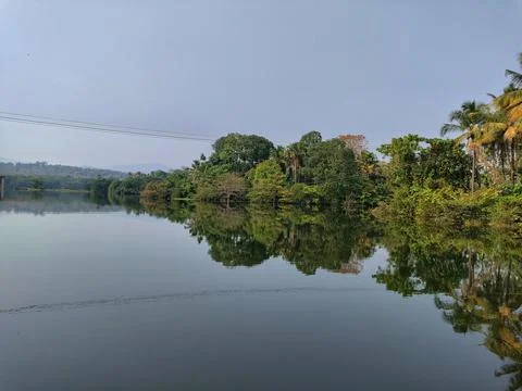 Reflection of nature on the surface of river. Stock Photos