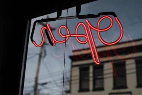 Reflection of neon open sign Foto stock