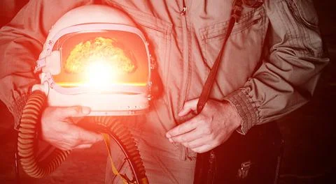 Reflection of a nuclear explosion in the visor of the pilot's helmet Stock Photos