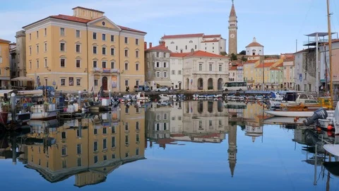 Reflection of old medieval architecture in water of port Видео 100366468