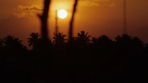 Reflection of orange sunset on the water surface of a lake Stock Footage 205208779