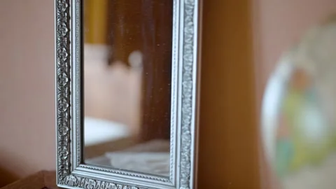 Reflection in an Ornate Vintage Mirror Stock Footage 263369978