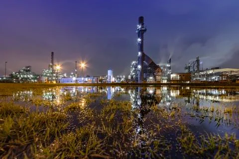Reflection of the panorama of a refinery  Stock Photos