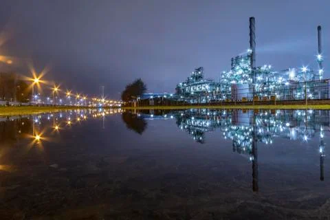 Reflection of the panorama of a refinery Photos