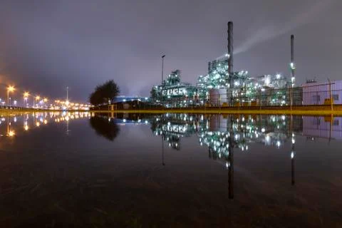 Reflection of the panorama of a refinery  Фото