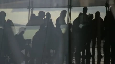 Reflection of people in line Stock Footage 20525243