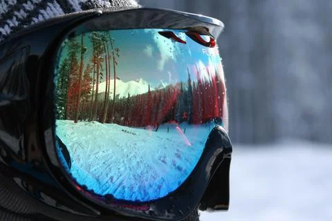 The reflection of a person in a pair of ski Stock Photos