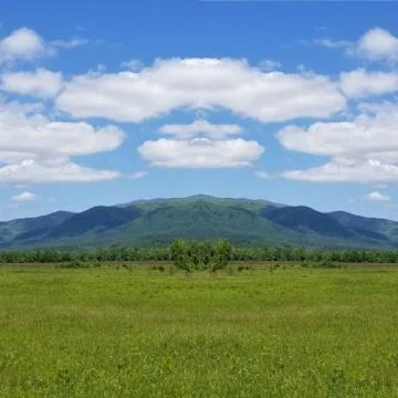 Reflection Photo Collage of Cloud Shadows on Mountainside in May 2 Stock Photos