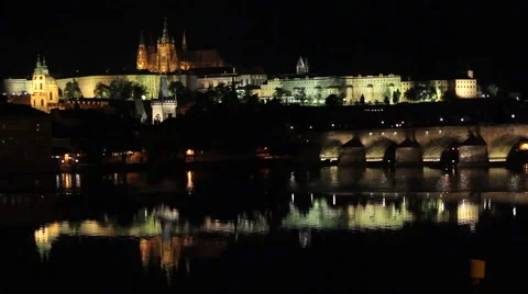 Reflection of Prague caste and the Charles bridge at dusk Stock Footage 52772777