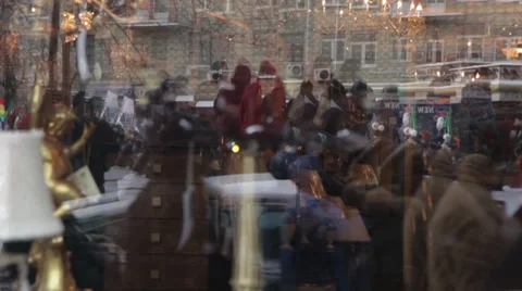 A reflection of the protesting crowds in the storefront Stock Footage 30460866