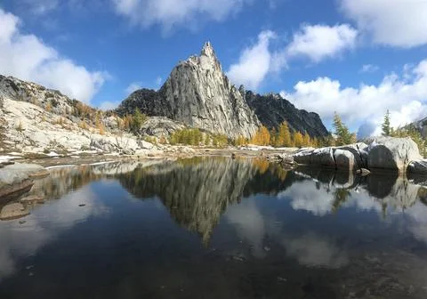 Reflection of Prusik Peak in a small lake in the Enchantments Stock Photos
