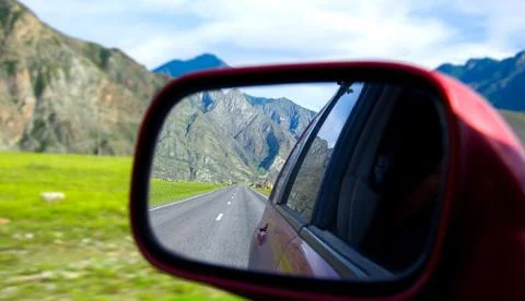 Reflection in the rear view mirror, in the car. Stock Photos