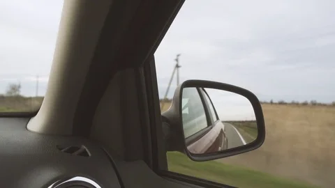Reflection in the rearview mirror Stock Footage 82970530