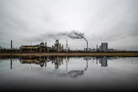 Reflection of refineries and its chimney Photos