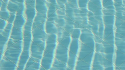 Reflection refraction in the water of the resort pool close-up Stock Footage 228503618