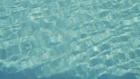 Reflection refraction in the water of the resort pool close-up Stock Footage 228504087