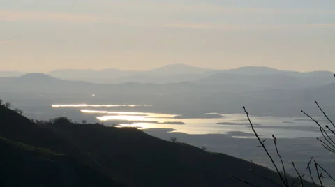 Reflection of a reservoir lake from the mountain Stock Footage 49653575
