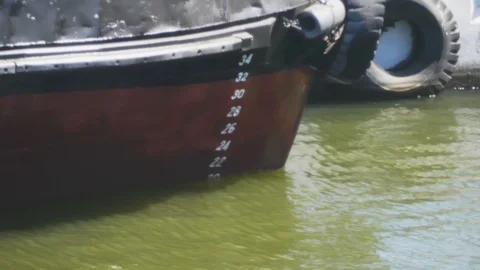 Reflection of ripples and waves on board of commerce ship. Sunlight water ref Stock-Footage 114625733