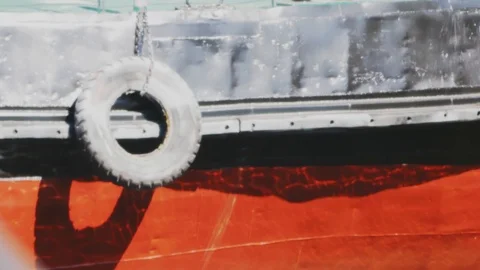 Reflection of ripples and waves on board of commerce ship. Sunlight water ref 動画素材 114625965