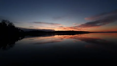Reflection of the rising sun in the water - Lysaker Stock Footage 149437173