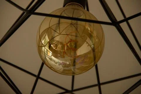Reflection of a room in a light bulb Stock Photos